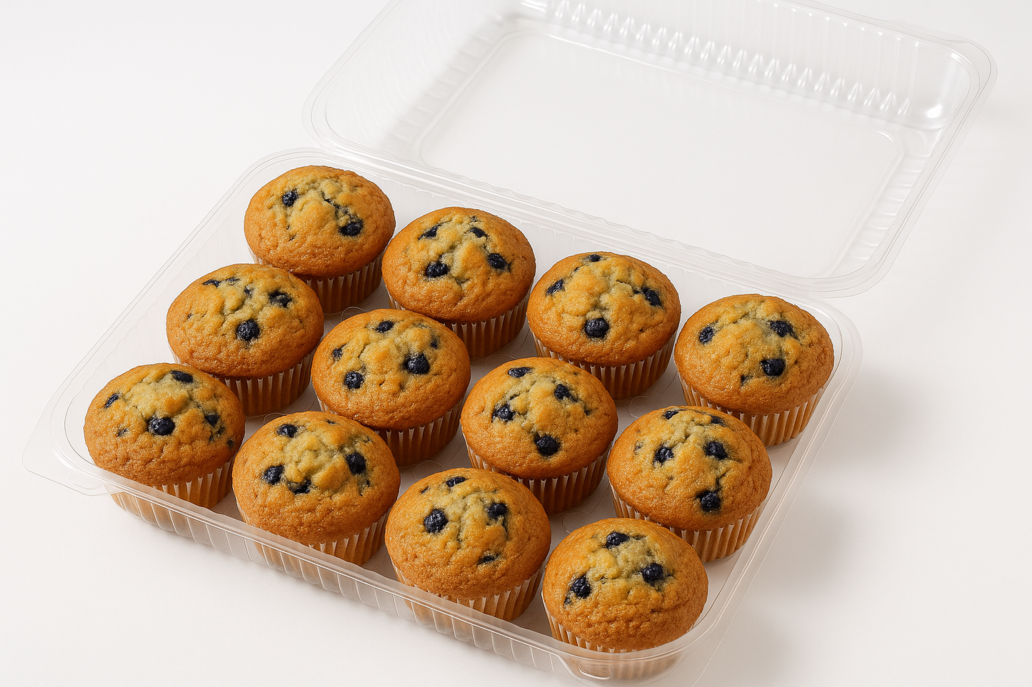 12 Pack blueberry muffins baked high in plastic container open white background